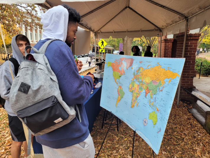 TFTL Global Week tent and map with students