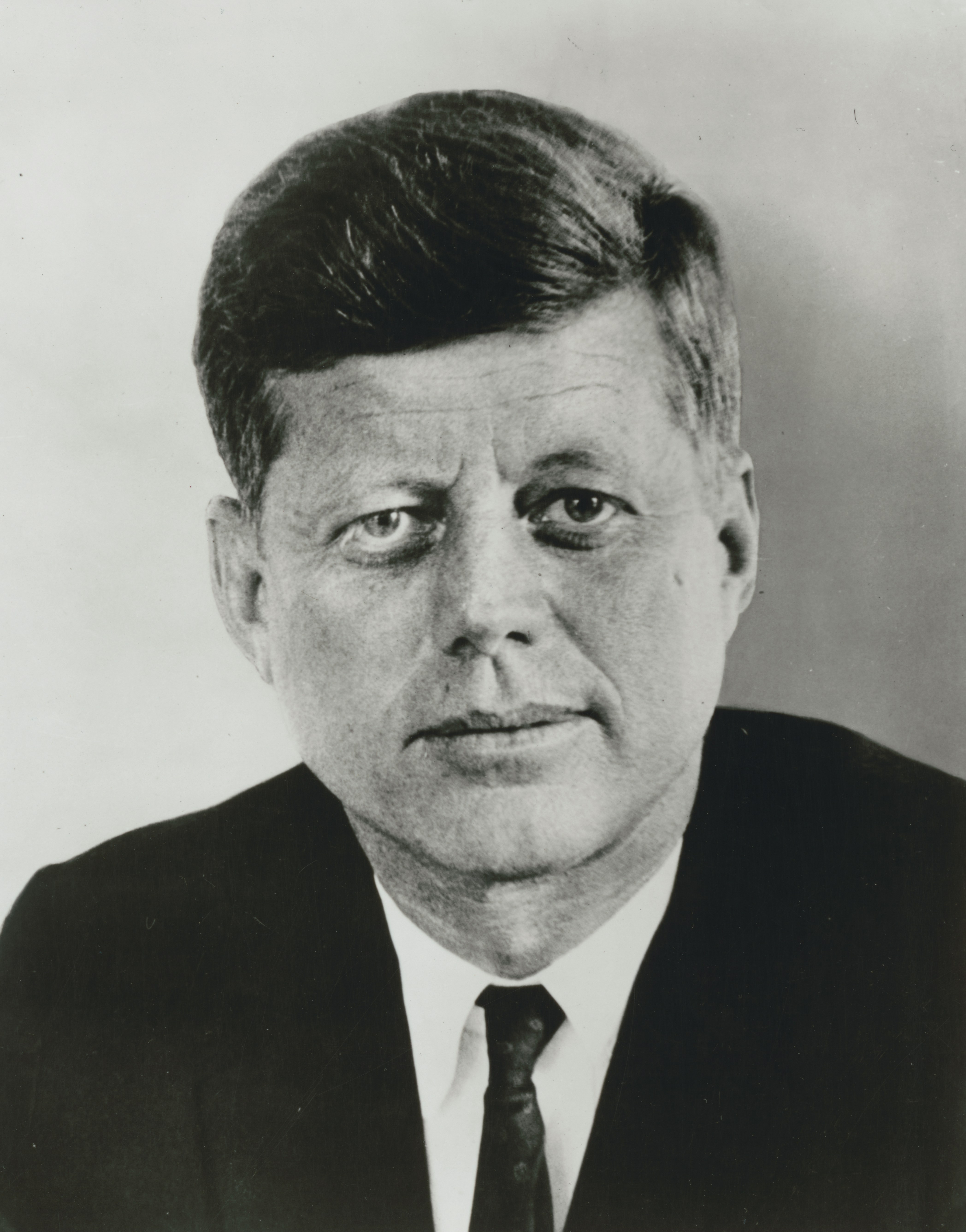 President John F. Kennedy, head and shoulders portrait, facing front